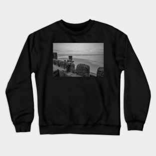 Close up of wooden sea defences protecting against coastal erosion Crewneck Sweatshirt